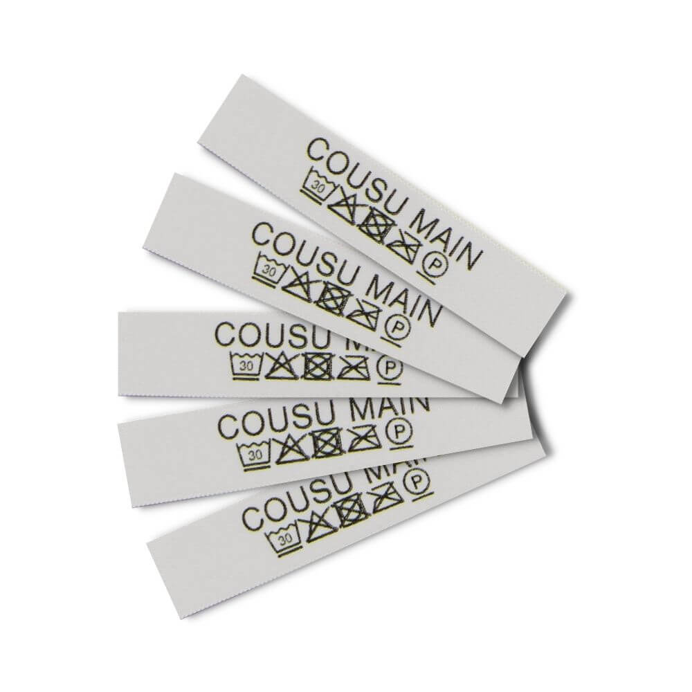 Care labels with washing and care symbols - Französisch