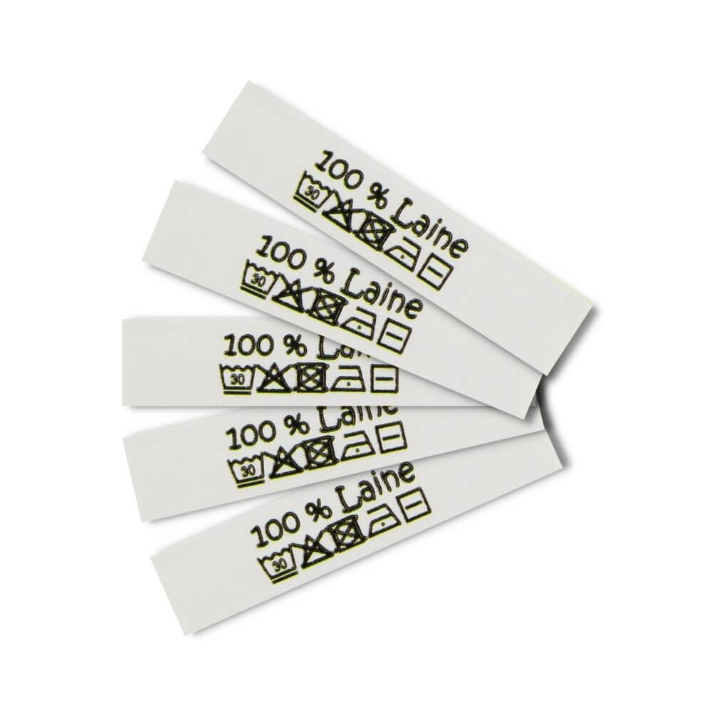 Care labels with washing and care symbols - Französisch