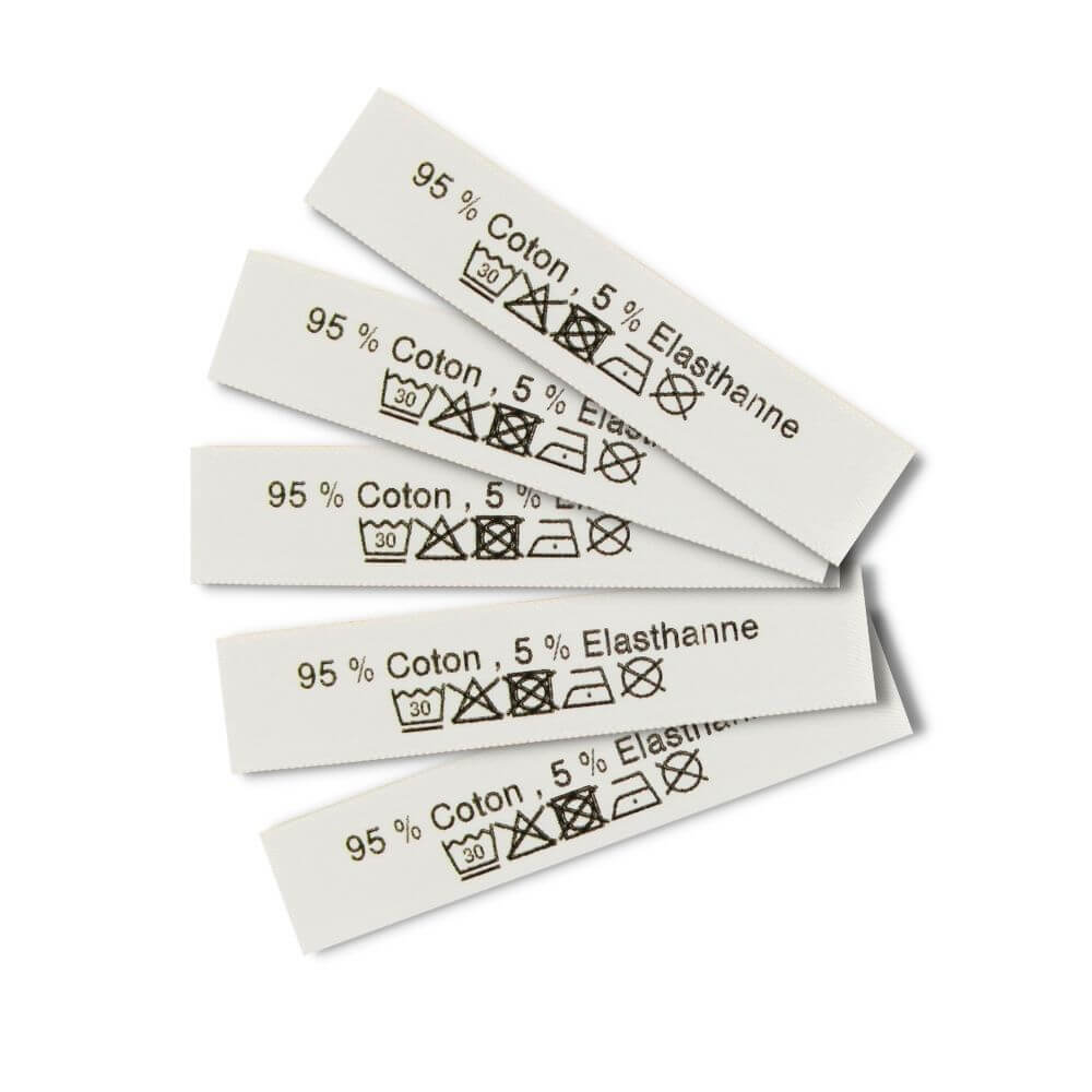 Care labels with washing and care symbols - Französisch