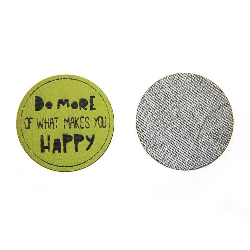 Leather labels, with the inscription "DO MORE OF WHAT MAKES YOU HAPPY"