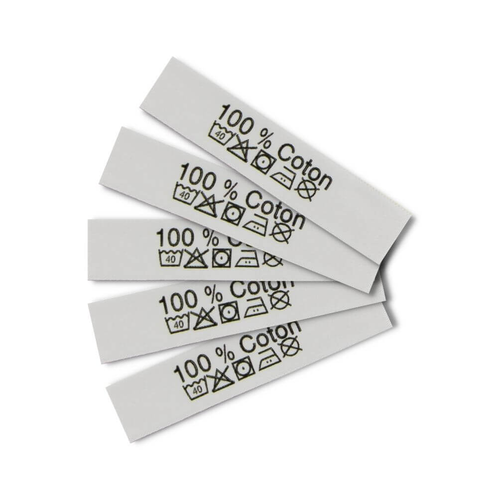 Care labels with washing and care symbols - Französisch
